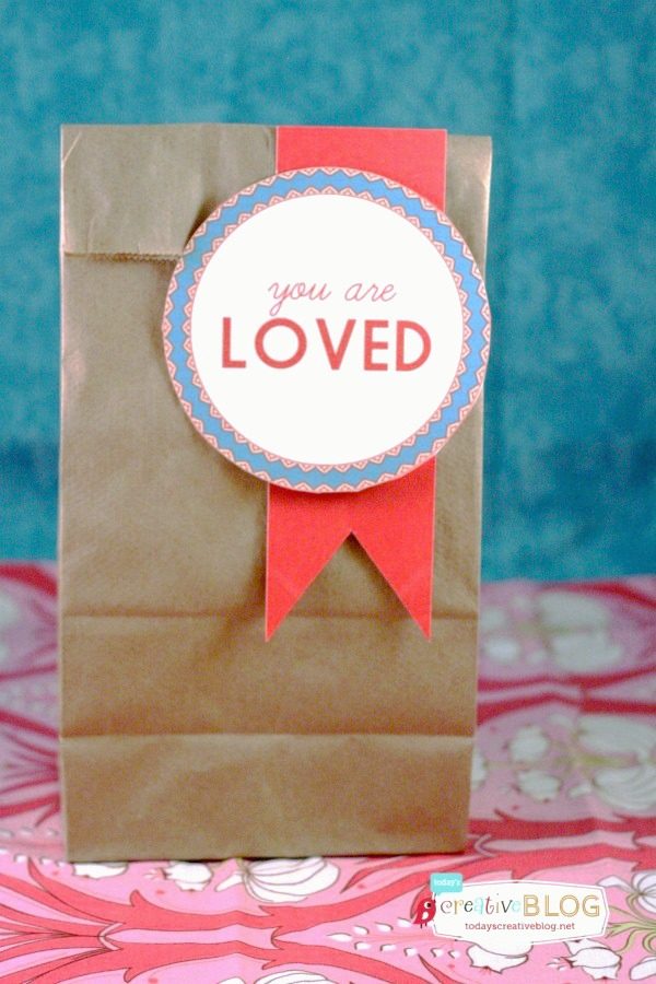 Printable Valentine | Free printable gift tags or labels for Valentine's Day on a brown lunch sack for a gift bag. 