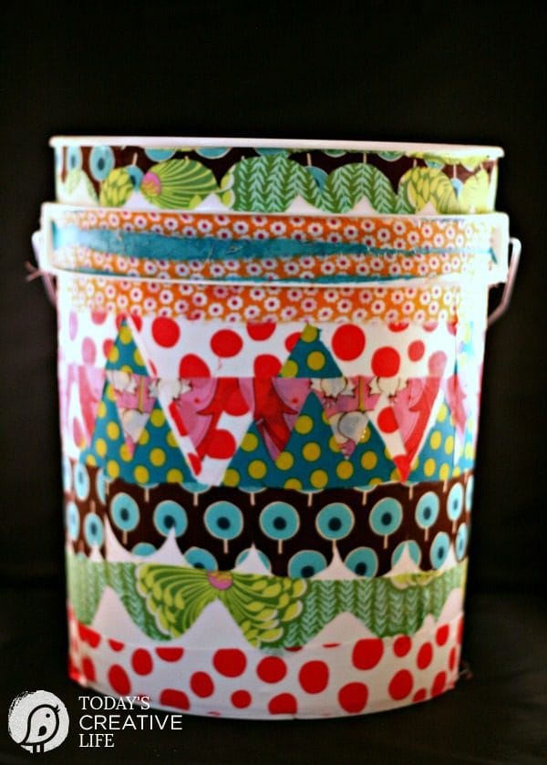 What to Decoupage | This great idea is a 5 gallon bucket turned craft room trash can! Get creative with Mod podge.