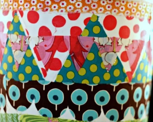 What to Decoupage | This great idea is a 5 gallon bucket turned craft room trash can! Get creative with Mod podge.