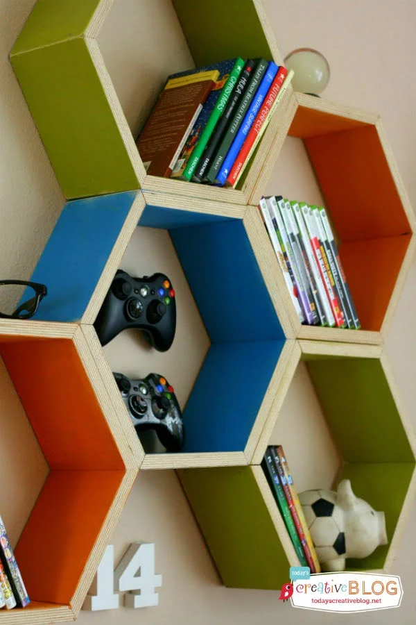 Cool bedroom for teen boys | Hexagon Shelving | Designed with help from Aaron Christensen