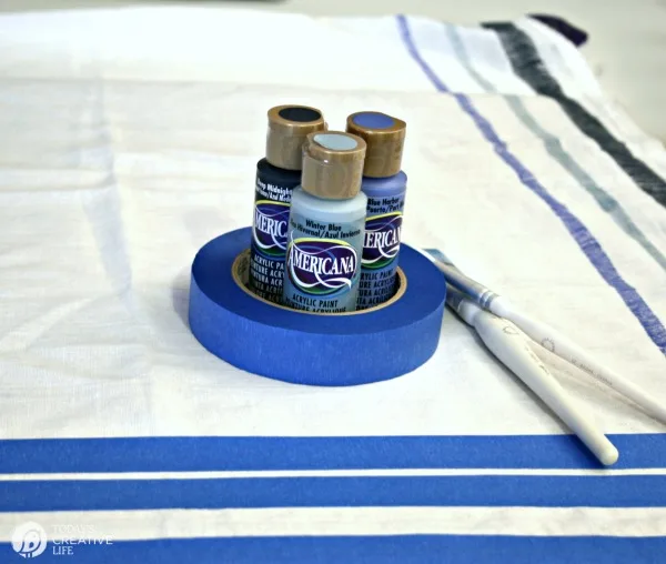 Painted Fabric Supplies - Tape, brushes, acrylic paints.