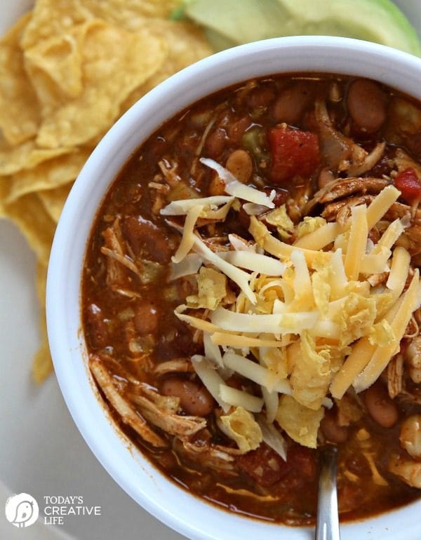 Crock pot Chicken Tortilla Soup in a white bowl.