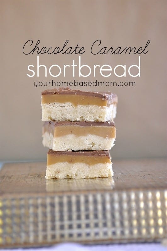 a stack of layered chocolate caramel shortbread cookies