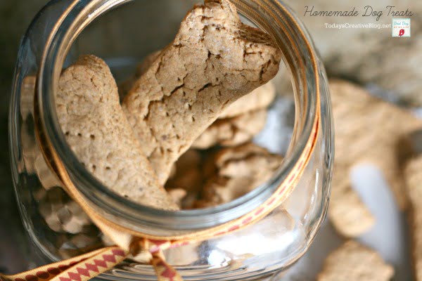 a clear jar filled with homemade dog treats