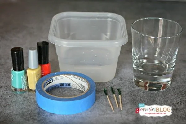 DIY Marbled Glassware Using Nail Polish|Create a marbled look using nail polish. Follow this easy tutorial on TodaysCreativeLife.com