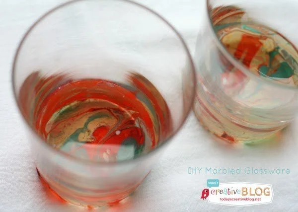 DIY Marbled Glassware Using Nail Polish|Create a marbled look using nail polish. Follow this easy tutorial on TodaysCreativeLife.com