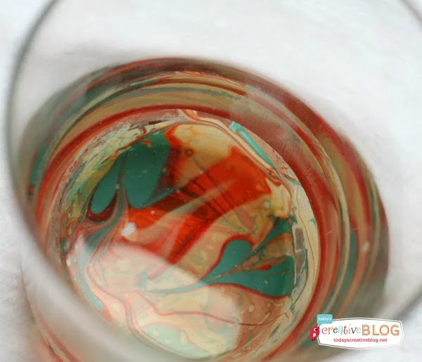 DIY Marbled Glassware Using Nail Polish|Create a marbled look using nail polish. Follow this easy tutorial on TodaysCreativeLife.com