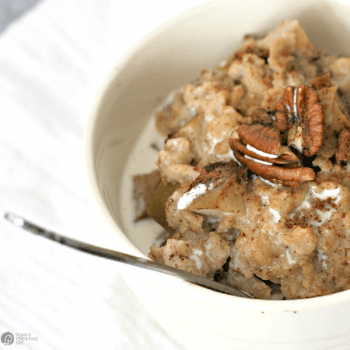 Bowl of oatmeal with nuts on top