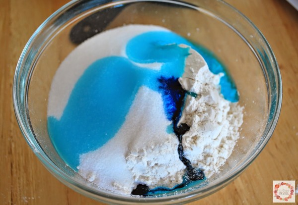 bowl of flour, salt, blue food coloring.