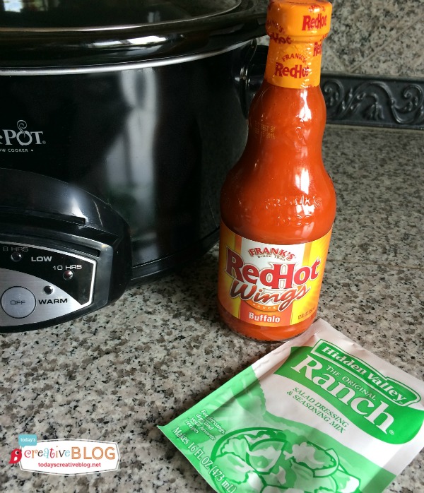 Crock Pot Shredded Buffalo Chicken | Menu planning just got easier! This easy slow cooker dinner idea is delicious and satisfying. Click the photo for the recipe on TodaysCreativeLIfe.com