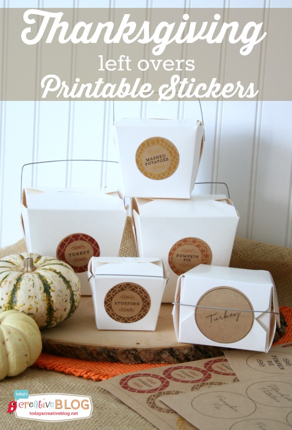 White takeout boxes with stickers for a Thanksgiving leftovers station.