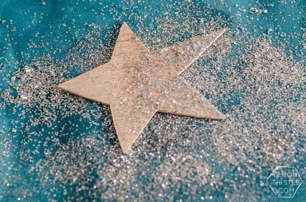 DIY Glittered Wood Star Ornaments | TodaysCreativeBlog.net