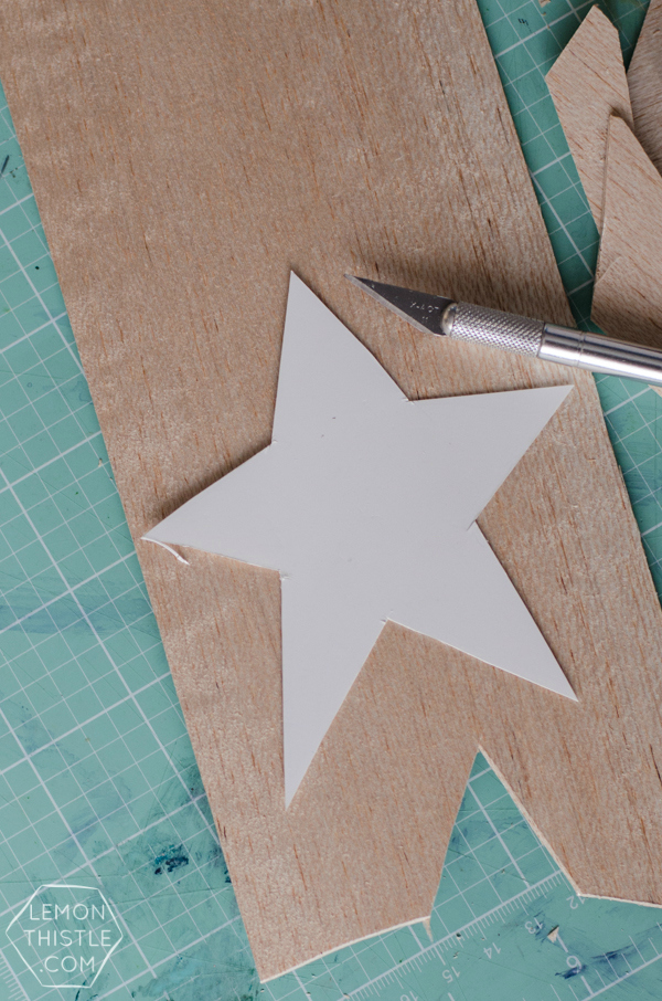 DIY Glittered Wood Star Ornaments | TodaysCreativeBlog.net