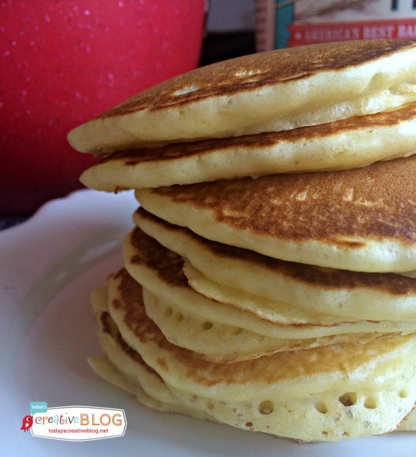 tall stack of fluffy cake flour pancakes