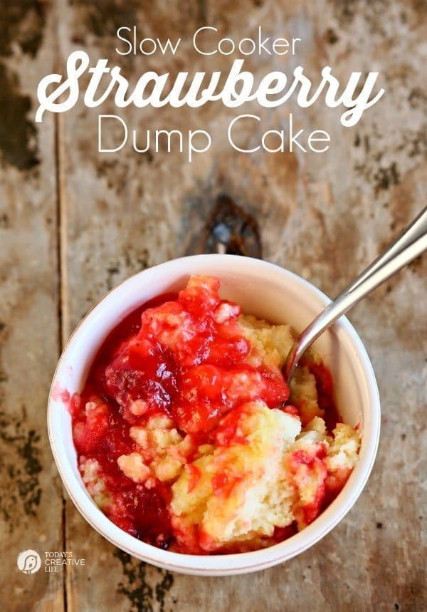 Slow Cooker Strawberry Dump Cake with Pineapple in a white bowl.