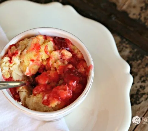 Slow Cooker Strawberry Dump Cake with Pineapple | This sweet and slightly tangy dessert is lip smacking good! See more slow cooker recipes on TodaysCreativeLife.com