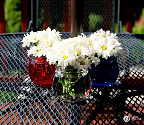 Easy Patriotic Table Decor | 4th of July table decoration | Red, White and Blue | See more creative ideas on TodaysCreativeLife.com
