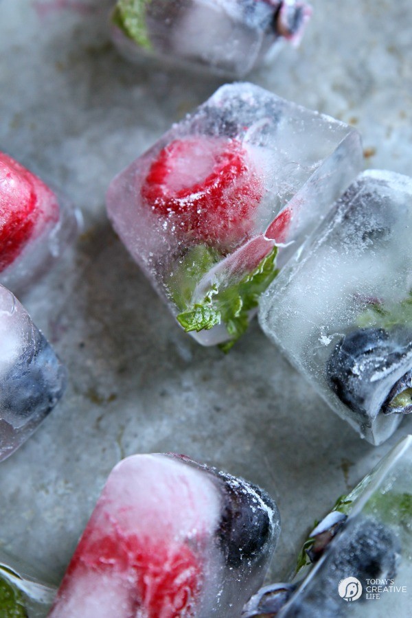 Fruit Filled Ice Cubes with Mint - Berry filled Ice cubes for fun entertaining. Great for 4th of July | See more on TodaysCreativeLife.com