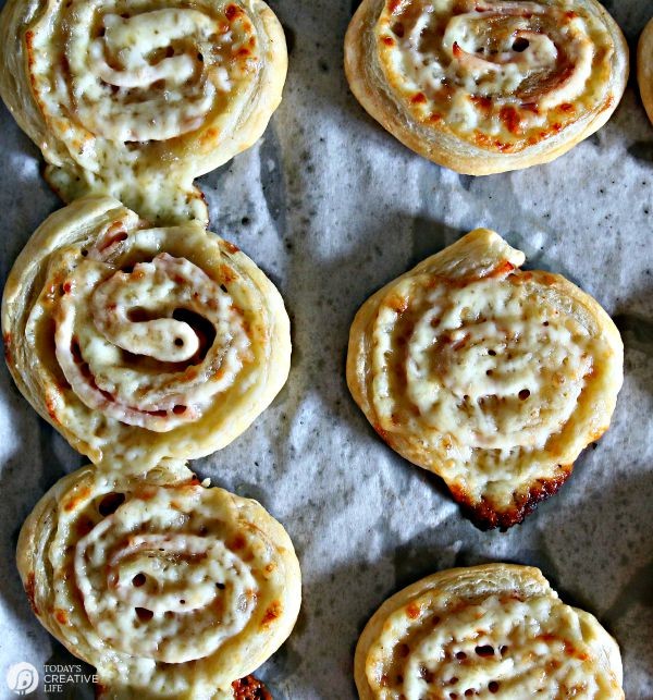 puff pastry pinwheel sandwiches made with turkey and white cheddar cheese