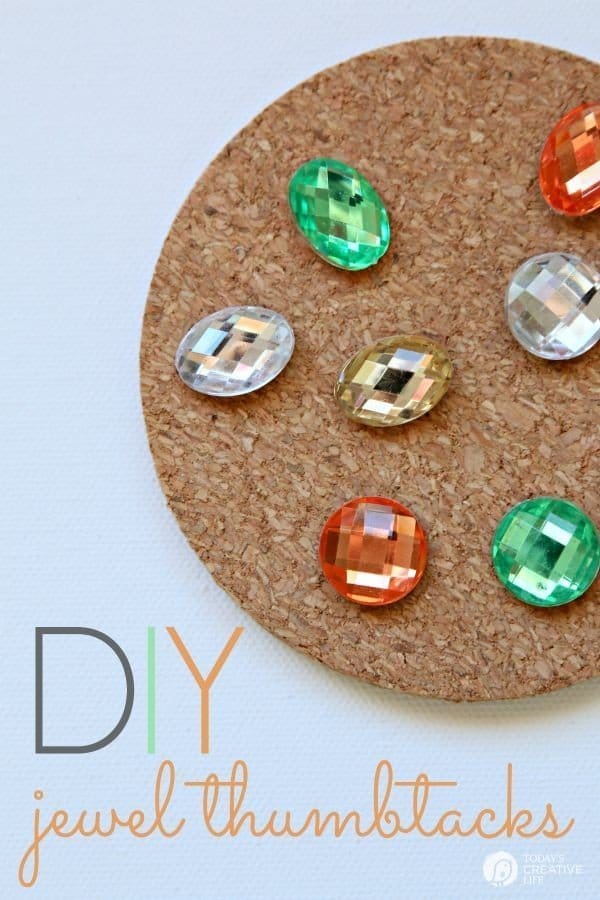 DIY Jewel Thumbtacks | This easy, quick and beautiful craft brings more personality to your bulletin board! Transform a boring and drab thumbtack into an attention getting push pin. See more on TodaysCreativeLife.com