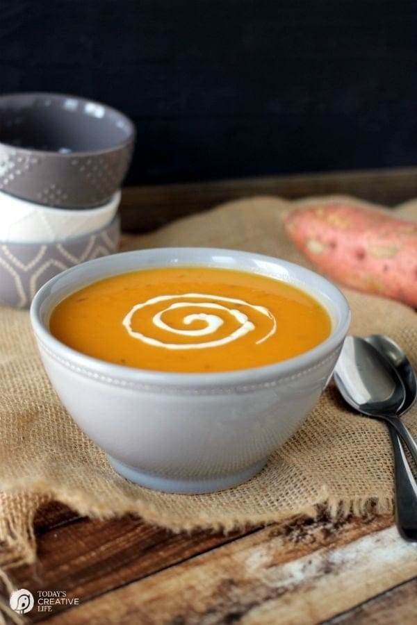 Slow Cooker Spicy Sweet Potato Soup | Easy Crock Pot soups are so good in the fall and winter! This healthy Sweet Potato soup makes a complete meal with some crusty bread and a salad! | See the recipe on TodaysCreativeLife.com