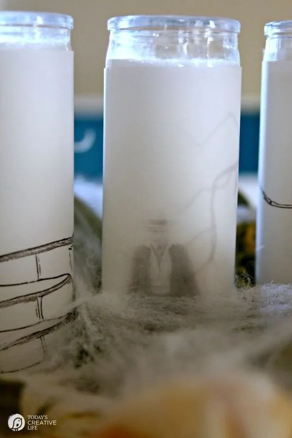 How to Make Spooky Halloween Candles | See the tutorial on TodaysCreativeLife.com | Make simple Halloween Decor in minutes! Easy Halloween Table Centerpiece