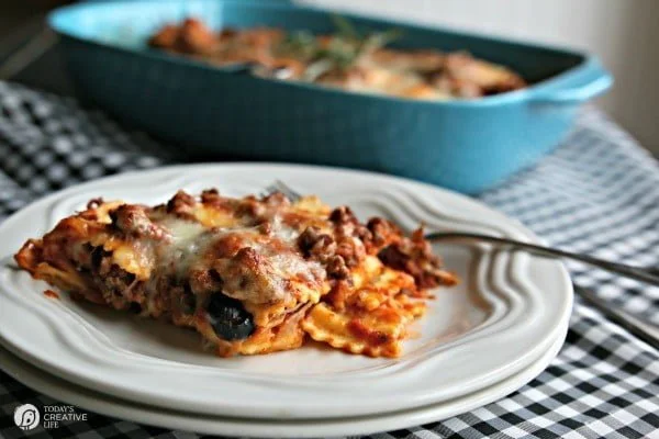 plated serving of ravioli casserole with meat sauce