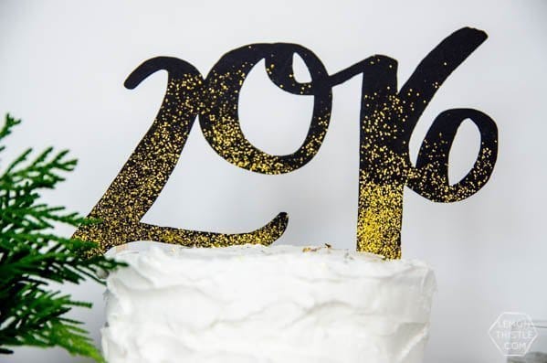 DIY 2016 Cake and Drink Toppers by LemonThistle for TodaysCreativeLife.com | Ring in the new year with glitter and your Cricut Explore! See the full tutorial on TodaysCreativeLife.com