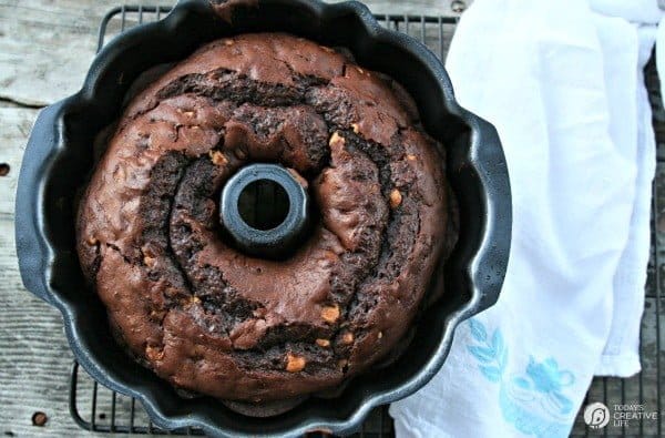 Chocolate Peanut Butter Chip Bundt Cake | Using a cake mix, instant pudding and a few other ingredients, makes this bundt cake the best cake recipe ever! Click the photo for the recipe! 