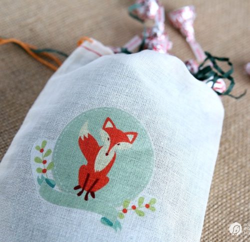 Easy DIY Holiday Gift Bags with GraphicStock | Make cute canvas gift back with iron transfers! See more on TodaysCreativelife.com