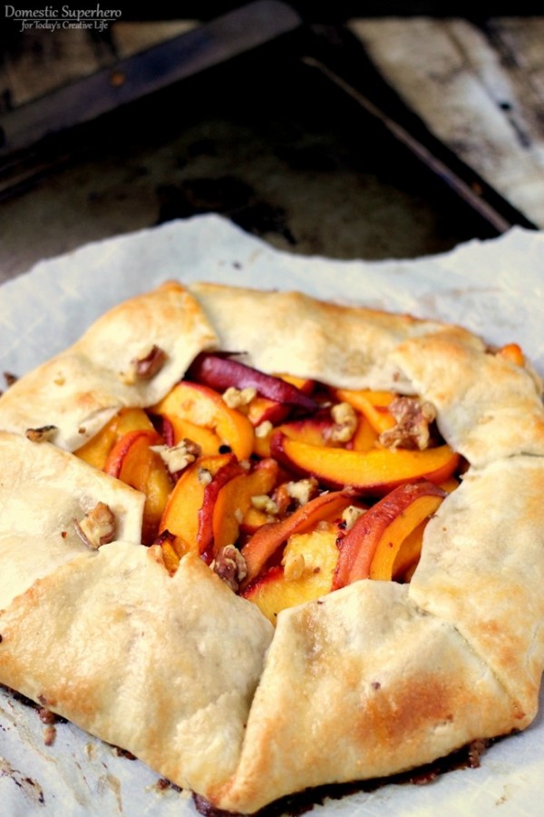 Peach Nectarine Galette by Domestic Superhero for TodaysCreativeLife.com | Make this simple fruit galette instead of pie! It looks fancy, but it's super easy! It's a delicious dessert idea for parties or just for the weekend! Click for the recipe. 