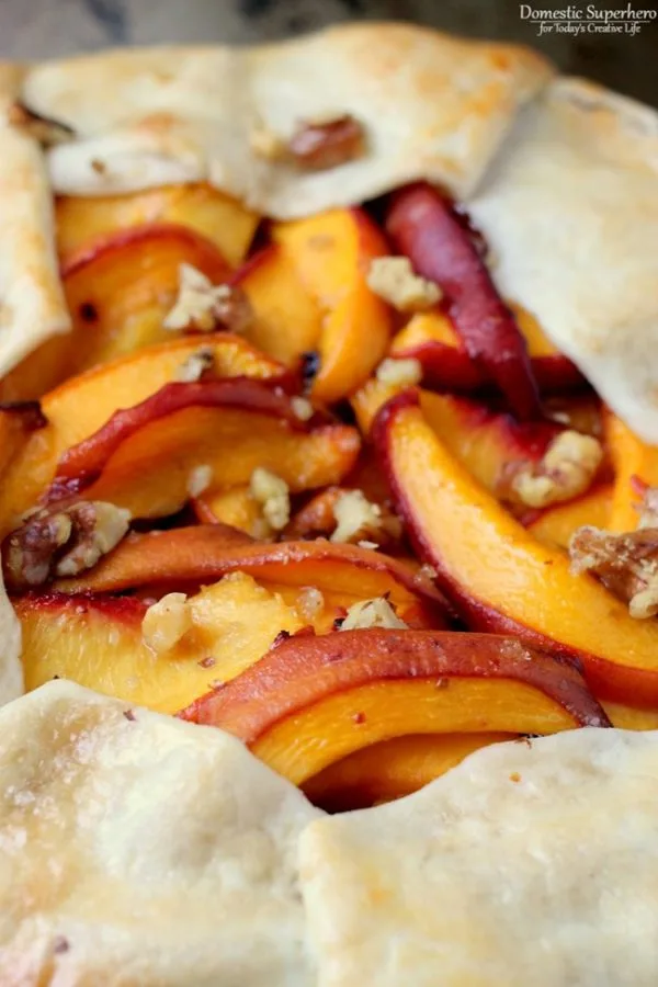 Peach Nectarine Galette by Domestic Superhero for TodaysCreativeLife.com | Make this simple fruit galette instead of pie! It looks fancy, but it's super easy! It's a delicious dessert idea for parties or just for the weekend! Click for the recipe. 