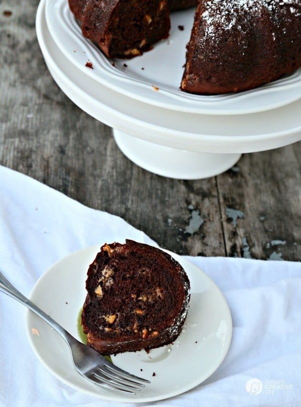 Chocolate Peanut Butter Chip Bundt Cake | Using a cake mix, instant pudding and a few other ingredients, makes this bundt cake the best cake recipe ever! Click the photo for the recipe! 