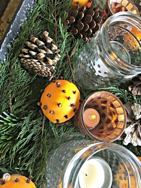 Orange Clove Natural Holiday Centerpiece | If you're looking for a simple, yet beautiful holiday decorations, here you go! Look to nature for your easy decorating solutions. It's fragrant and classic. See more on TodaysCreativeLife.com