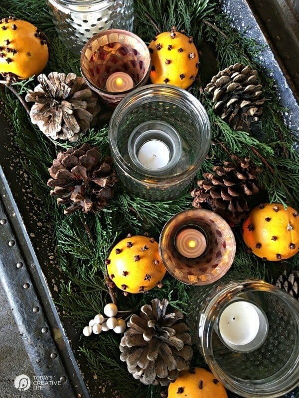 Orange Clove Natural Holiday Centerpiece | If you're looking for a simple, yet beautiful holiday decorations, here you go! Look to nature for your easy decorating solutions. It's fragrant and classic. See more on TodaysCreativeLife.com