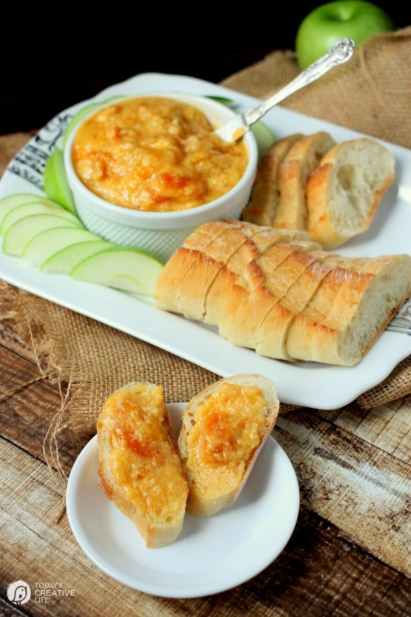 Slow Cooker Apricot Brie Dip | Here's your perfect party food! This party dip recipe is easy to make in your crock pot and ready to take to any potluck! See the recipe on TodaysCreativeLife.com