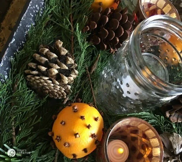 Orange Clove Natural Holiday Centerpiece | If you're looking for a simple, yet beautiful holiday decorations, here you go! Look to nature for your easy decorating solutions. It's fragrant and classic. See more on TodaysCreativeLife.com