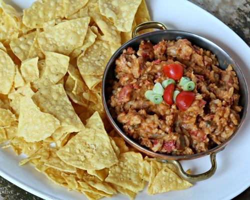 Slow Cooker Mexican Taco Dip | This crock pot dip recipe is great for super bowl, or any game day! Great for potlucks or weekend snacking! Click the photo for the recipe.
