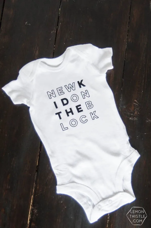 DIY Cricut Iron On Onesie | Creative contributor Lemon thistle has created this adorable custom designed baby onesie and is sharing the free graphic. Follow this easy tutorial by clicking on the photo. TodaysCreativeLife.com