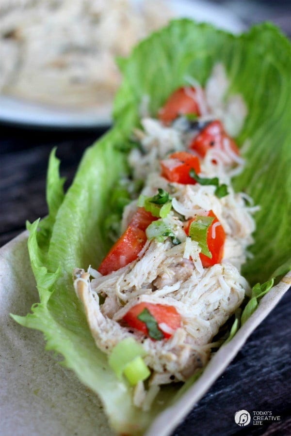 Chicken Lettuce Wraps | Slow Cooker Caesar Chicken Lettuce Wraps are just one of the many meals made with this slow cooker Caesar Chicken recipe. Click on the photo for the recipe. TodaysCreativeLife.com