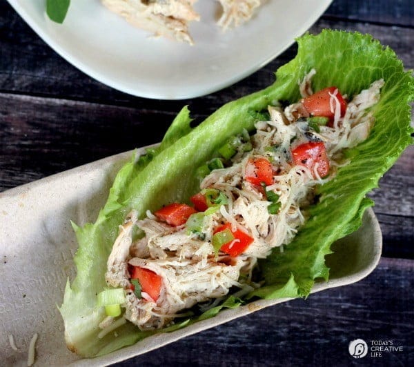 Chicken Lettuce Wraps | Slow Cooker Caesar Chicken Lettuce Wraps are just one of the many meals made with this slow cooker Caesar Chicken recipe. Click on the photo for the recipe. TodaysCreativeLife.com