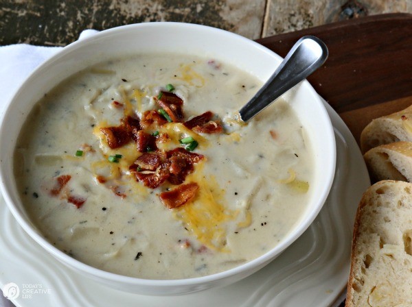 bowl of hearty potato soup with bacon and cheese