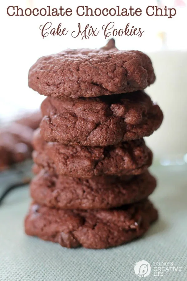 a stack of chocolate cake mix cookies with chocolate chips