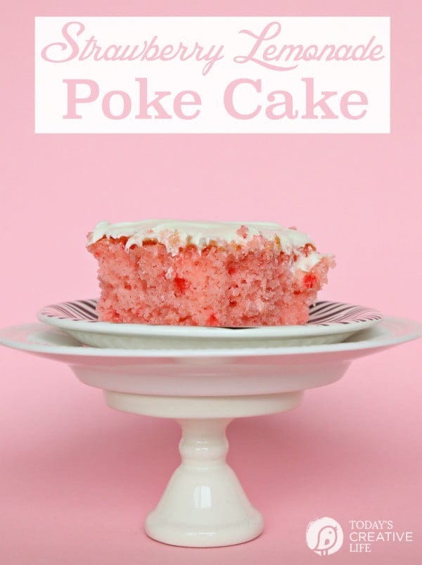 Strawberry Lemonade Cake | This is no ordinary cake, it's a strawberry lemonade poke cake that will delight your tastebuds! It's the perfect cake for spring time desserts. This doctored up cake box mix is the best short cut you'll ever take! Click the photo for the recipe! TodaysCreativeLife.com