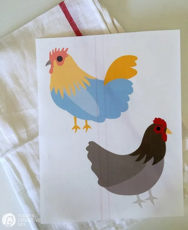 Iron-on Transfer paper with 2 chickens printed.