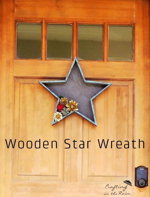 DIY Patriotic Door Decor made with a Wood Star with faux succulents 