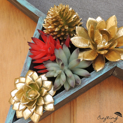 gold painted faux succulents for crafting a DIY Patriotic Door Decor