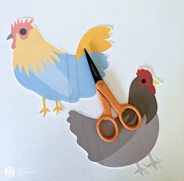 two graphics of chickens printed on iron-on paper