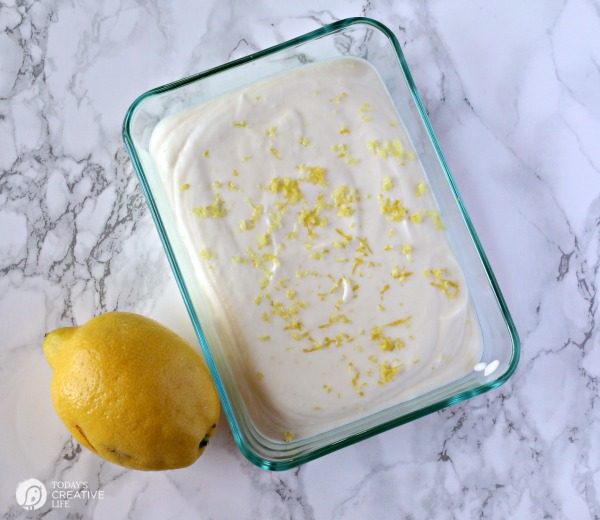 Tangy Lemon Ice Cream | This recipe has only 3 ingredients! It's the perfect summer dessert. See the recipe on TodaysCreativeLife.com