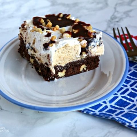 Peanut Butter Layered Dessert | This layered Chocolate Peanut Butter Dessert will knock your socks off! Rich and delicious! TodaysCreativeLife.com